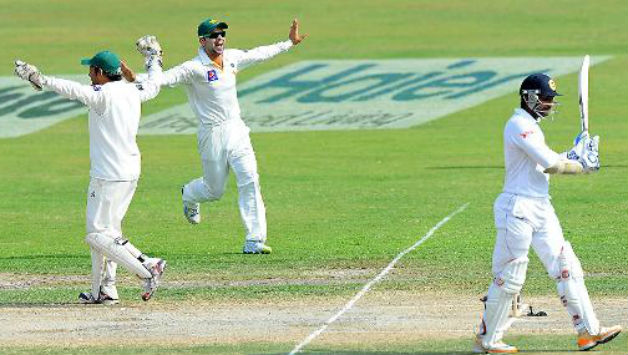 Pakistan celebrate the dismissal of Kumar Sangakkara (in picture) © AFP