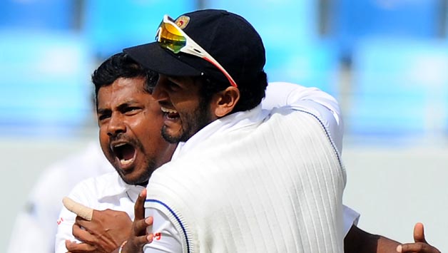 Rangana Herath scalped the key wicket of Misbah-ul-Haq © AFP