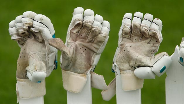 Cricket-gloves-are-displayed-on-a-fence-during-the-one-day-final-match-between-the