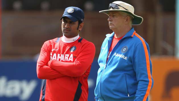 MS Dhoni (left) and Duncan Fletcher © Getty Images