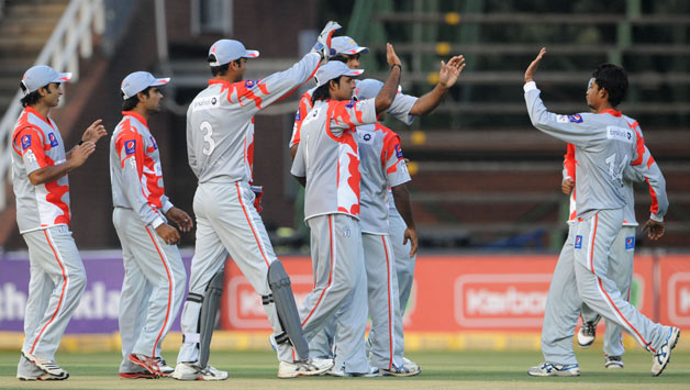 Players-of-Sialkot-Stallions-celebrate-the-wicket-of-Michael-Carberry-of-Hampshire-during