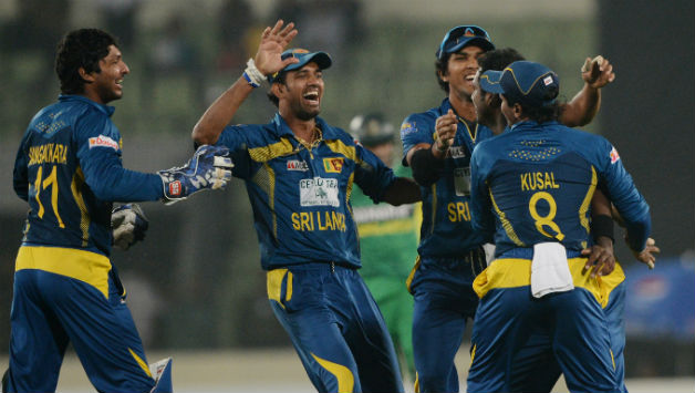 Sri Lankan cricketers react after winning the first One-Day International (ODI) cricket match between Bangladesh and Sri Lanka