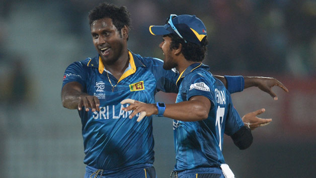 Angelo Mathews (left) was on a hat-trick in his first over © Getty Images 