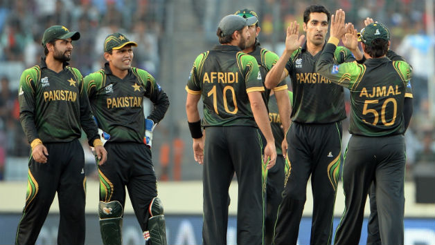 Umar Gul (second from right) took three wickets for Pakistan © AFP