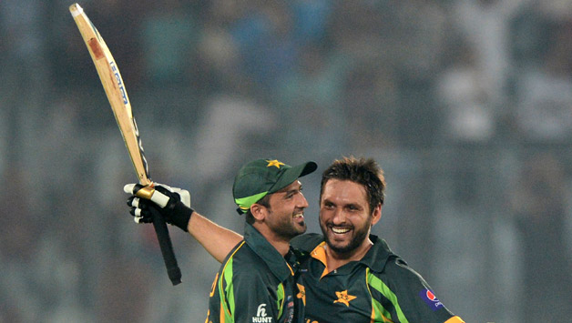 Shahid Afridi (right) won the cliffhanger against India in typical Afridi-esque manner, hitting R Ashwin for two sixes © AFP