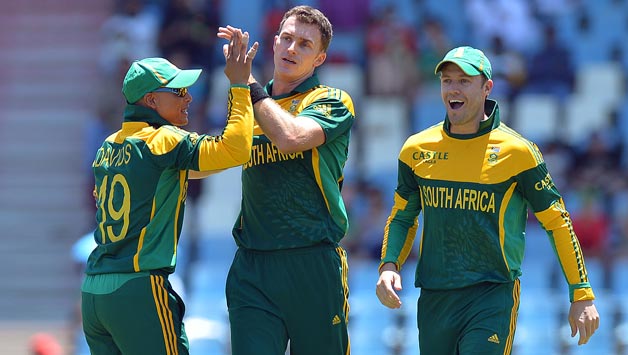 South-Africa's-cricketer-Ryan-McLaren-(C)-celebrates-the-wicket-of-Pakistan's-cricketer-Umar-Amin