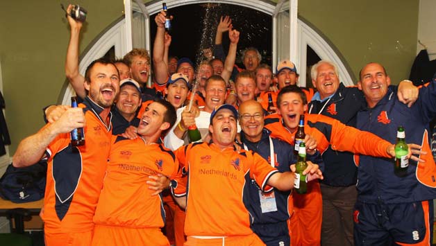 A jubilant Netherlands team celebrate their first win over England in T20 © Getty Images