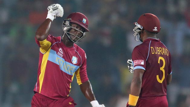 Dwayne-Bravo-and-Darren-Sammy-of-the-West-Indies-gesture-after-hitting-a-boundary-during-the-ICC-World-Twe