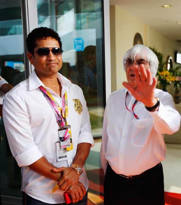 Sachin Tendulkar (left) with F1 boss Bernie Ecclestone during the Indian GP in 2011 © Getty Images