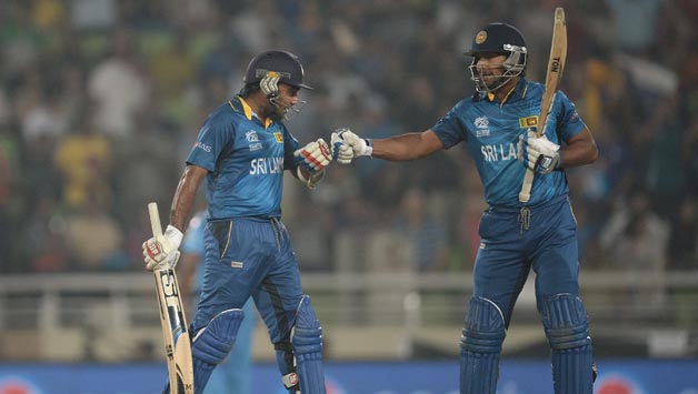 Mahela-Jayawardena-and-Kumar-Sangakkara-of-Sri-Lanka-touch-gloves-during-the-ICC-World-Twenty20-Bangladesh-2014-Fina