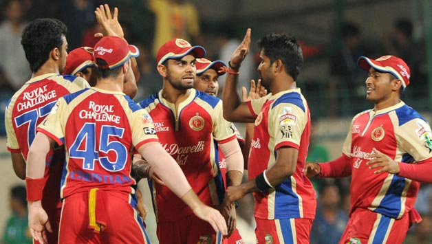 RCB-players-celebrate-fall-of-wicket-during-a-match-between-RCB-and-MI-in-Bangalore-4