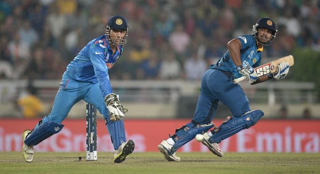 umar-Sangakkara-of-Sri-Lanka-hits-the-ball-past-Mahendra-Singh-Dhoni-of-India-during-the-ICC-World-Twenty20