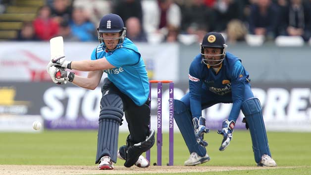 Eoin-Morgan-of-England-attempts-a-reverse-sweep-with-Kumar-Sangakkara-of-Sri-Lanka-looking-on-during-the-2nd-Roy