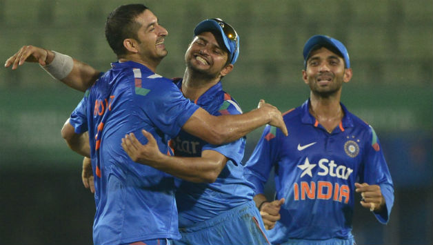 Mohit Sharma (left) took four wickets for India © AFP