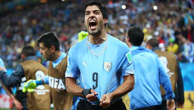 Luis Suarez celebrates Uruguay's win over England © Getty Images