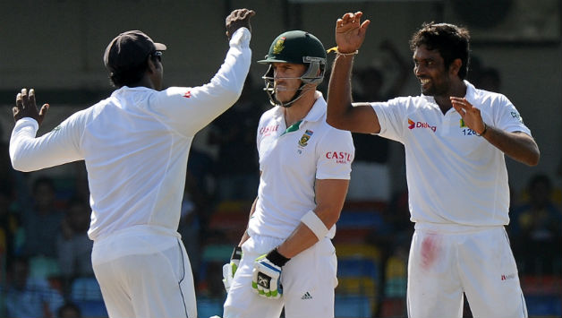 Sri lankan spinners toiled hard but failed to finish off the South African tail on a turning wicket © AFP