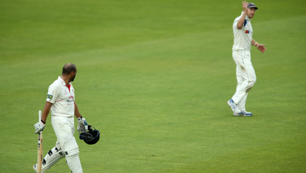 Andrew Gale (background) indulges in a verbal volley with Lancashire's Ashwell Prince © Getty Images