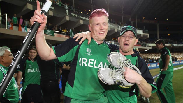 Kevin O'Brien (left) and his brother Niall celebrate Ireland's victory against England in the 2011 World Cup © Getty Images