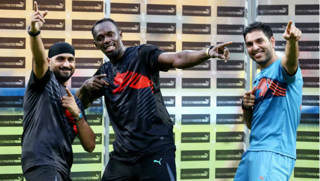 (Clockwise from left) Harbhajan Singh, Usain Bolt and Yuvraj played an exhibition cricket match at the Chinnaswamy on Tuesday © PTI