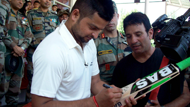 Suresh Raina presented Aditya Garhwal an autographed bat and even Delhi Daredevils scouts monitoring his performance © IANS (File Photo)