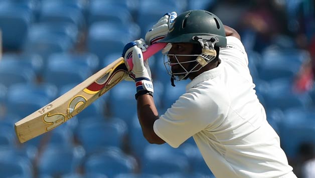 Tamim Iqbal was dismissed off Tinashe Panyangara while going for a big shot and handing it back to the bowler as he departed for just 20 © AFP
