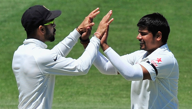 Karn Sharma (right) took three wickets © Getty Images