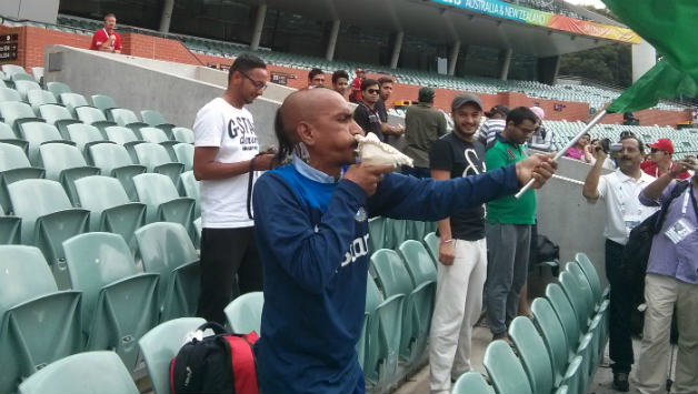 Sudhir Kumar blows the conch at the Adelaide Oval as the Indian team begins practice. Photo courtesy - Nishad Pai Vaidya.