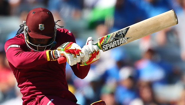 Chris Gayle ducks a bouncer during the match against India © Getty Images