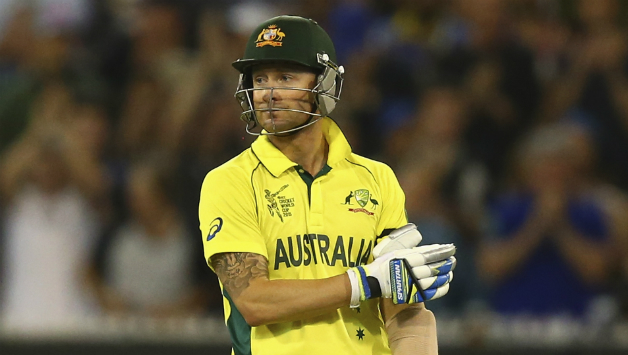 Michael touched his black armband in tribute of the late Phil Hughes © Getty Images