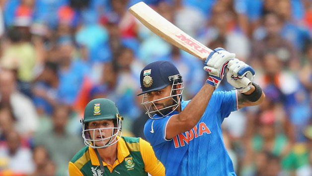 Virat Kohli (in blue) said the Indian team never stopped believing despite the poor show in the tri-series © Getty Images