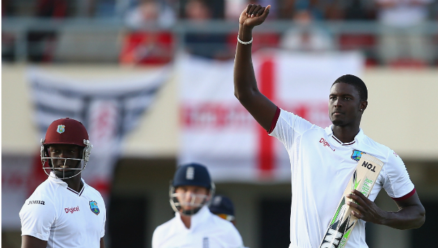 Jason Holder (right) batted beautifully to take West Indies to a draw © Getty Images