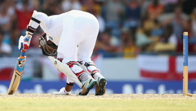 Marlon Samuels (above) is bowled by Stuart Broad for 20 off 35 balls © Getty Images