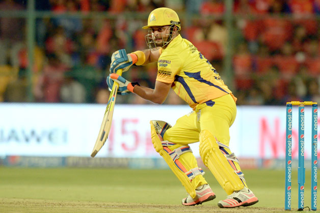 Suresh Raina (above) was dism8issed for 28 by off-spinner Harbhajan Singh after being stumped by Parthiv Patel © IANS