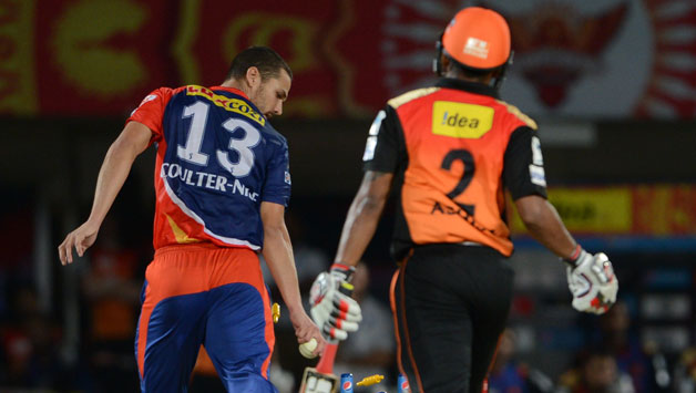 Karn Sharma was dismissed for mere 16 by fast-bowler, Nathan Coulter-Nile (left), after being caught by Jayan Yadav at point © IANS