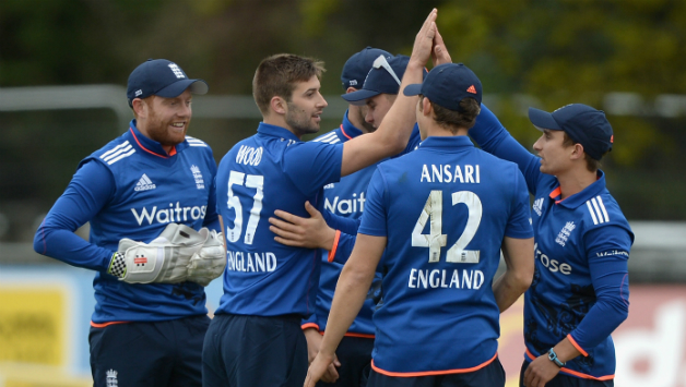 Mark Wood (second from left) celebrates his maiden ODI wicket with his England team-mates © Getty Images