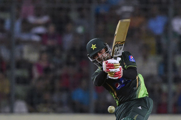 Mohammad Hafeez (above) was dismissed for a healthy 86 by Prosper Utseya after being bowled by him © AFP