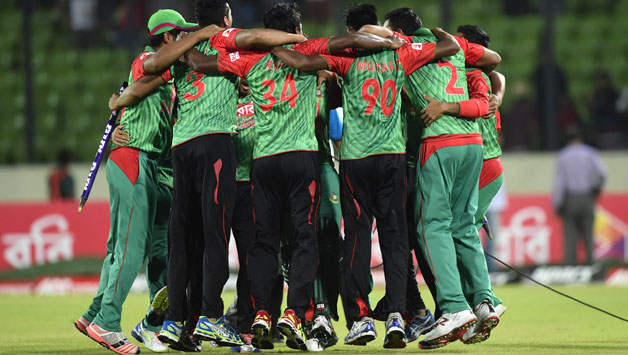 Bangladesh cricketers celebrate their historic win over India © AFP