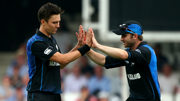Trent Boult (left) celebrates the dismissal of England batsman Sam Billings with Kane Williamson © Getty Images