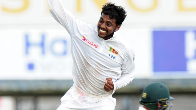 Tharindu Kaushal trots in at an awkward angle, tilts his body to his left to give him leverage © AFP