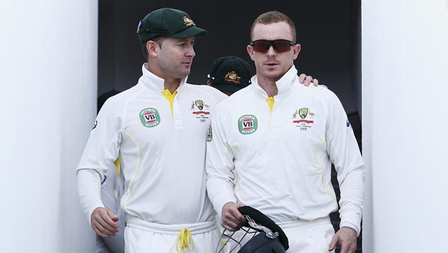 Michael Clarke (Left) felt additional head security was vital following Chris Rogers' head-injury related dizziness © Getty Images