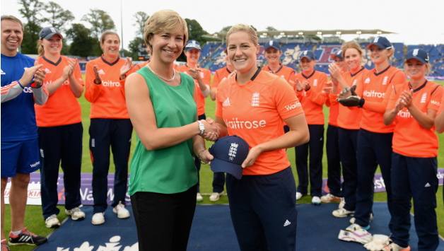 Katherine Brunt (right) receives her 50th T20I cap from Claire Conner © Getty Images