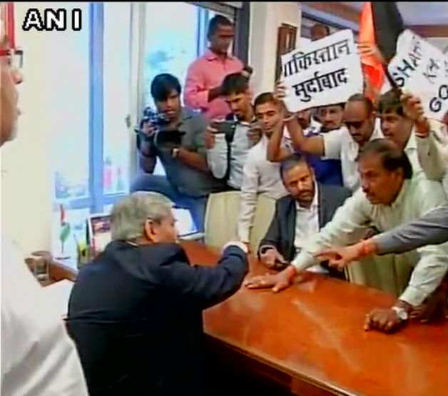 Shashank Manohar, the BCCI chief, is seen tackling the Shiv Sainiks at the BCCI office on Monday. Photo courtesy: ANI