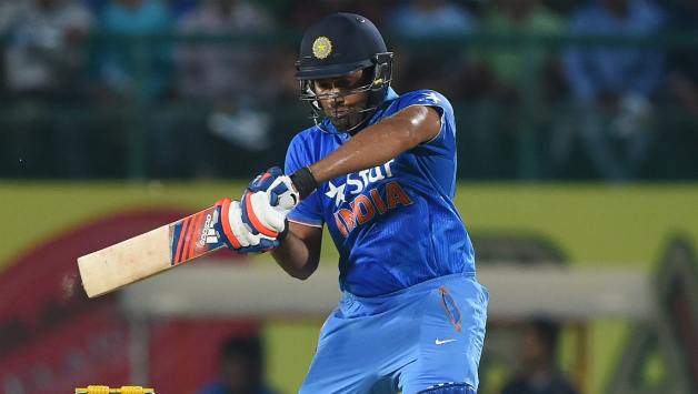 Rohit Sharma became the first Indian batsman to score a century on home soil © AFP