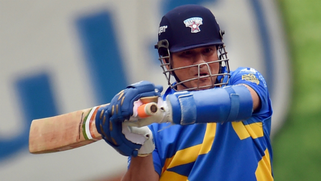 Sachin Tendulkar (above) scored his half-century and fell for 56 to Daniel Vettori © AFP