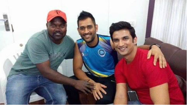 MS Dhoni (centre) with Sushant Singh Rajput (right) and a member of the film crew © IANS