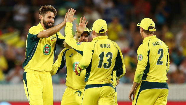 Kane Richardson (left) took 5 for 68 to win the game for Australia © Getty Images