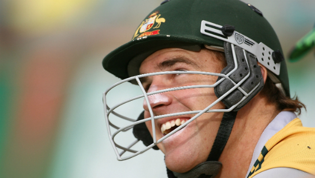 Luke Pomersbach in the dugout, waiting for his turn to bat in his only international match © Getty Images