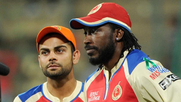 Virat Kohli (Left) and Chirs Gayle will be entrusted to score a huge chunk of runs for RCB in IPL 2016 as well © IANS