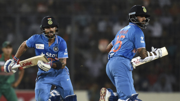 Shikhar Dhawan (left) and Virat Kohli put on a match-winning stand © AFP