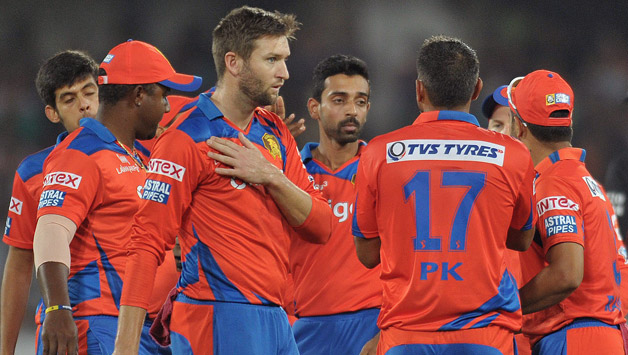 Chris Gayle and KL Rahul were dismissed for nine and duck, respectively, by fast bowler Dhawal Kulkarni (middle) © AFP